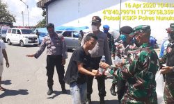 TNI-Polri Nunukan Bagikan Nasi Kotak dan Masker ke Warga Terdampak Covid-19