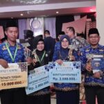 Kholis, Guru MIN 1 Tanjung Redeb Juara I MTQ VI KORPRI Nasional Cabang Kaligrafi