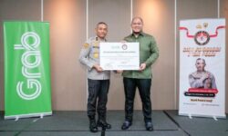 Tingkatkan Kualitas Layanan, Grab dan Polri Jalin Kerja Sama