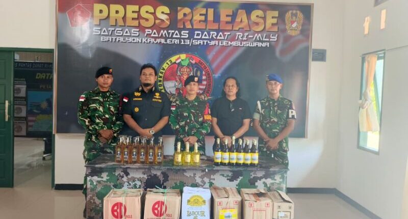Satgas Pamtas Yonkav 13/SL Gagalkan Penyelundupan 722 Botol Miras